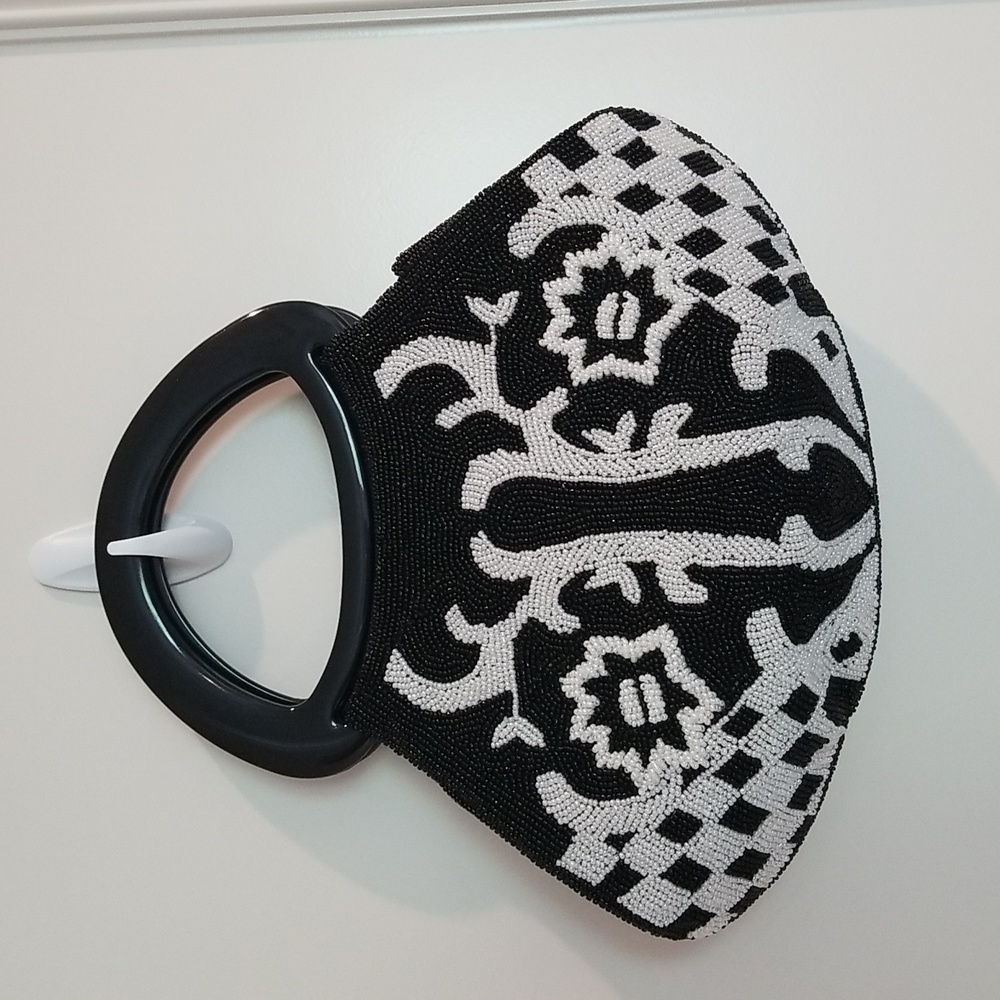 Beautiful beaded black and white Cache purse